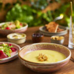 A picture of a selection of lunch items offered in The Garden, including bresaola, soup and prawn cocktails