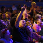 A dad points out an interesting part of the set to his son at Matilda The Musical Relaxed performance June 2022. Photo by Ellie Kurttz (c) RSC
